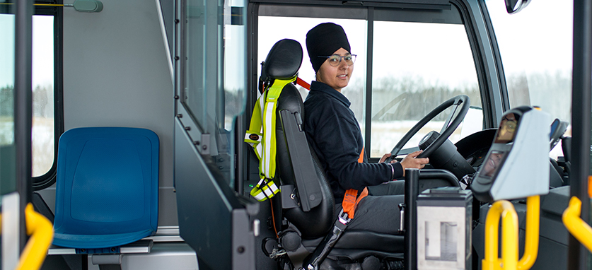 Female Driver driving bus